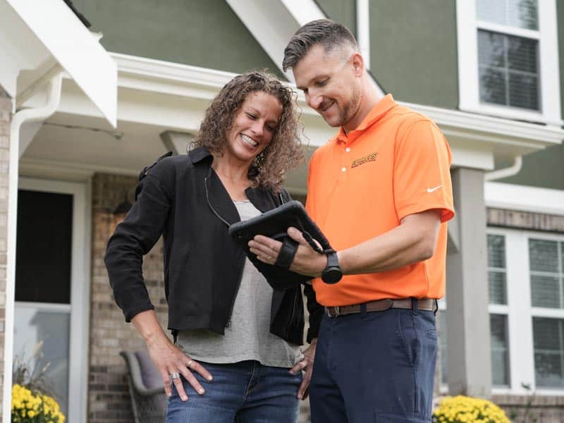 Summers PHC technician reviewing options with a Brownsburg homeowner