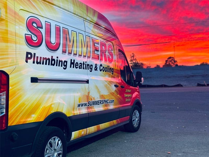 Summers PHC service van in a Bloomington-Normal-area neighborhood at sunset