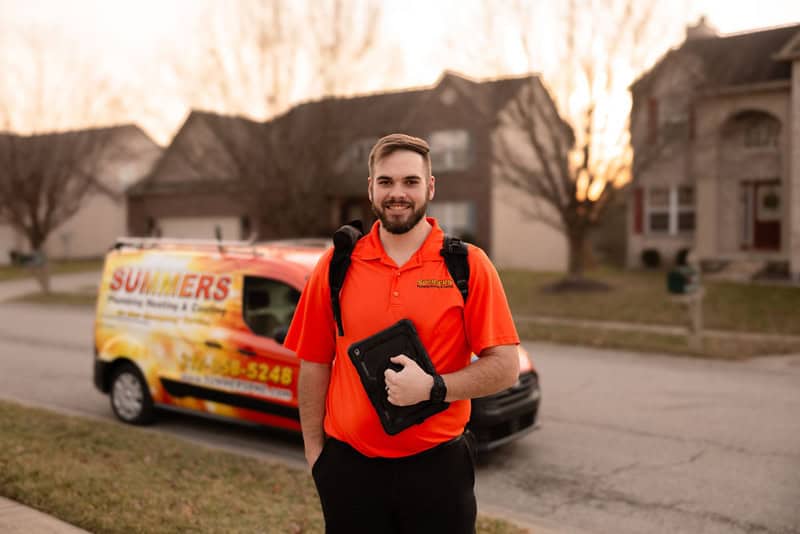 Summers PHC technician with a service van in a Brownsburg-area neighborhood